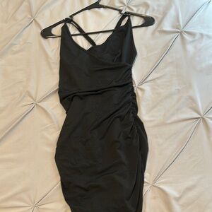 Black Mini Bodycon Dress with Ruching and Spaghetti Straps for Night Out